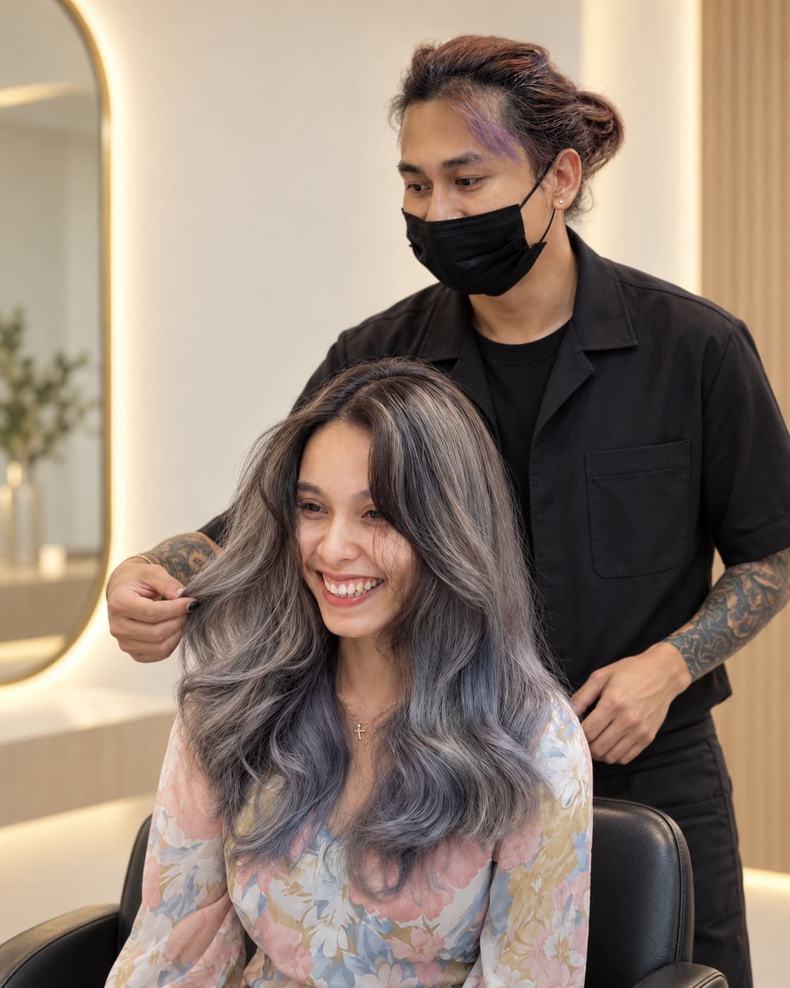 Stylist finishing a client's hair at Ivory Luxe Salon